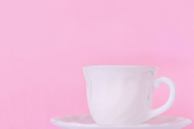 Close-up of coffee cup on table