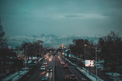 High angle view of highway in city at dusk