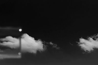 Low angle view of illuminated building against sky