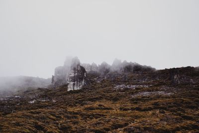 Scenic view of mountains during foggy weather