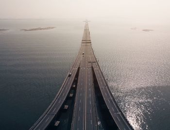 High angle view of bridge over sea against sky