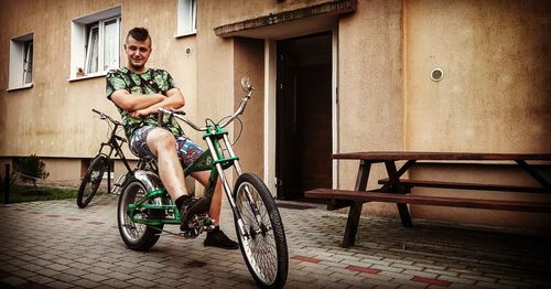 Man riding bicycle on street