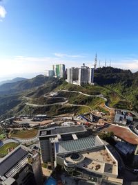 High angle view of buildings in city against sky