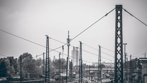 Electricity pylon against clear sky