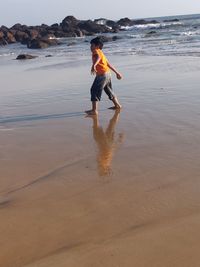 Full length of woman on beach