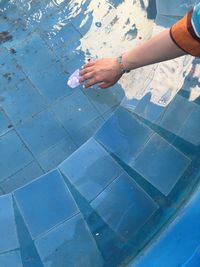 High angle view of woman swimming in pool