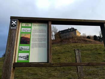 View of built structure on landscape against sky