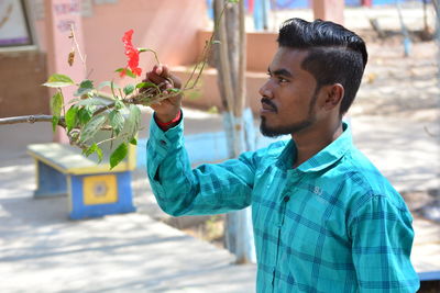 Young man looking at camera