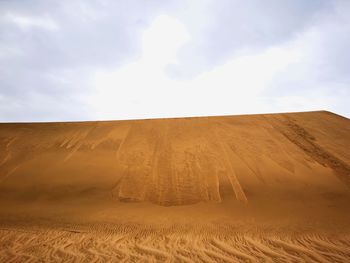 Scenic view of desert against sky