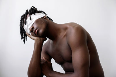 Black man wearing blindfold portrait