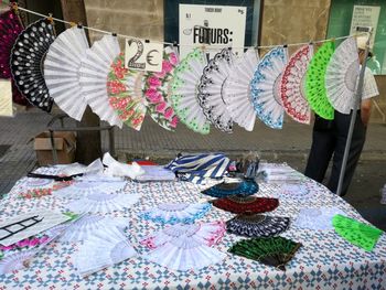 Multi colored umbrellas for sale in market