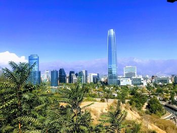 Modern buildings in city against sky