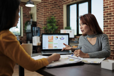 Businesswomen brainstorming at office