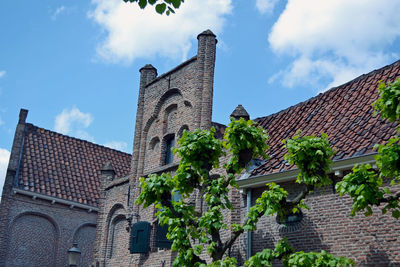 Low angle view of old building against sky