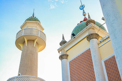 Low angle view of bell tower against building