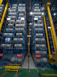 Low angle view of illuminated construction site at night