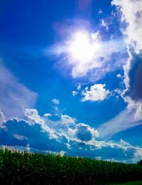 Scenic view of landscape against cloudy sky