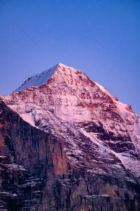 Eiger-mönch-jungfrau berner oberland mountains in their most beautiful and last sunset light. 