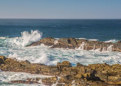 Scenic view of sea against clear sky