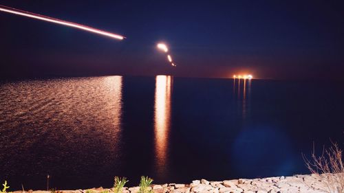 Illuminated street light at night