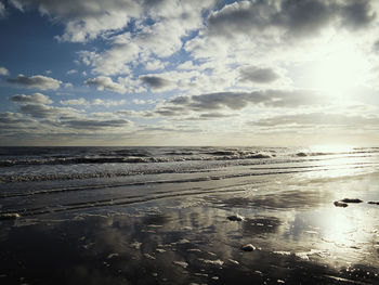 Scenic view of beach against sky