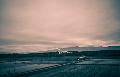 Scenic view of road against sky during sunset