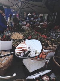 People at market stall