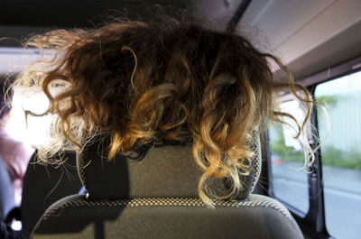 Portrait of woman in car