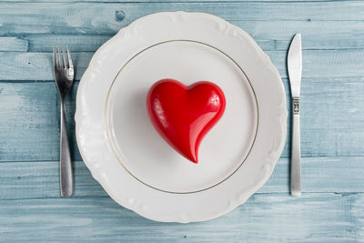 Directly above shot of heart shape in plate on table