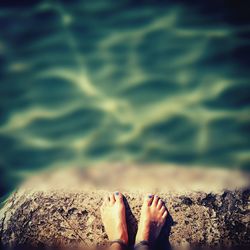 Low section of woman on beach