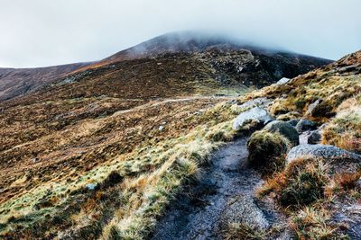 Scenic view of mountains during foggy weather