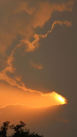 Low angle view of dramatic sky during sunset