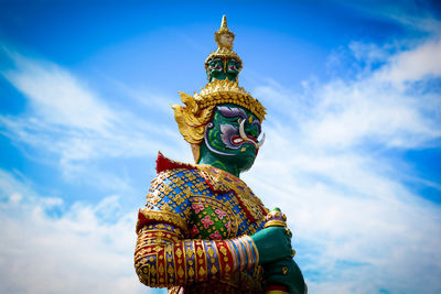 Low angle view of statue against sky