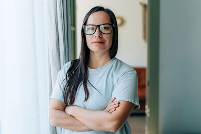 Portrait of a white woman in glasses