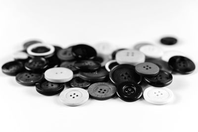 Close-up of buttons on table