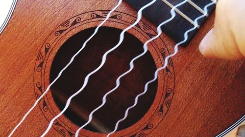 High angle view of hand on table