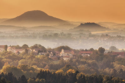 High angle view of townscape against sky during sunset