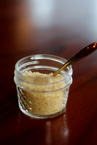 Close-up of glass of jar on table