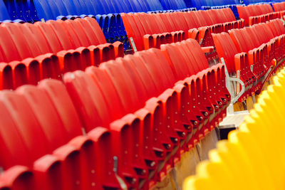 Close-up of empty seats in stadium