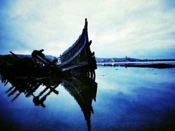 Reflection of cloudy sky on water