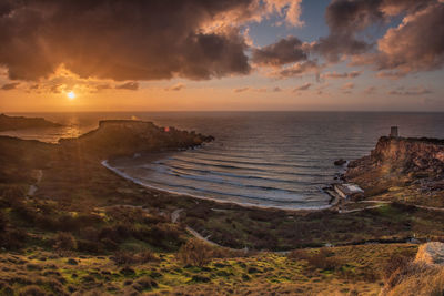 Scenic view of sea against sky during sunset