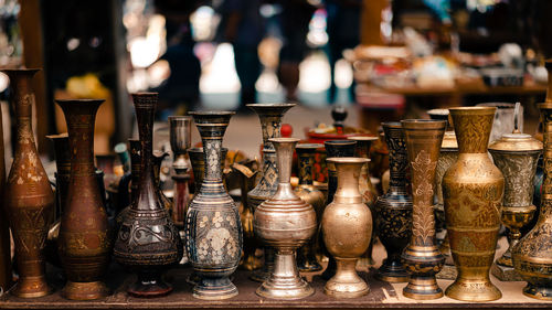 Close-up of vases on table