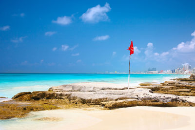 Scenic view of beach against sky