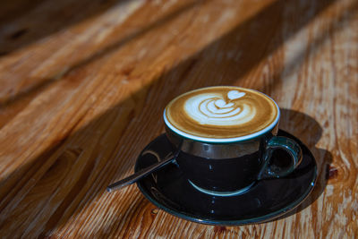 High angle view of coffee on table