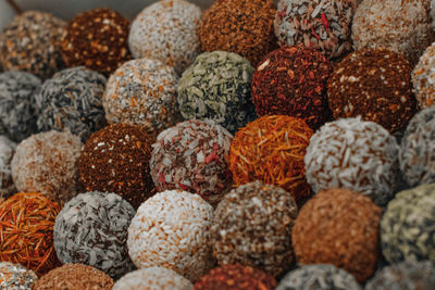 Assorted handmade truffle chocolates candies made from organic ingredients. raw food diet concept.