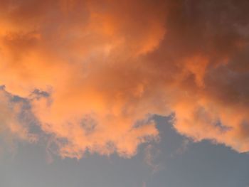 Low angle view of dramatic sky during sunset