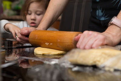 Midsection of woman preparing food