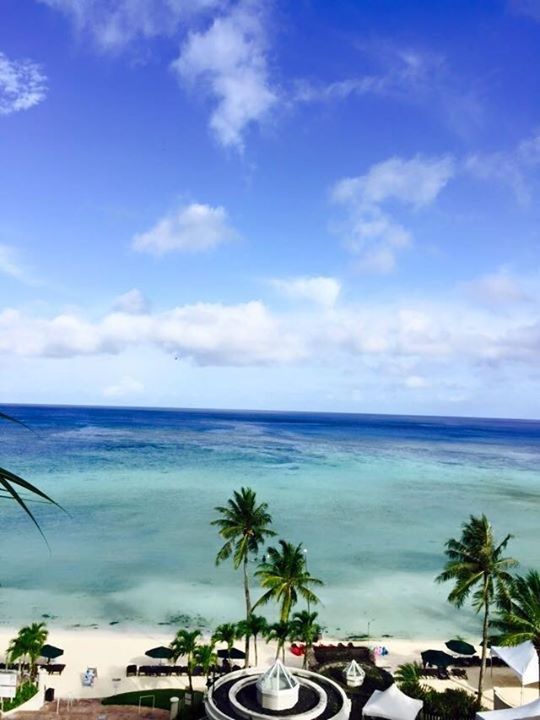 sea, palm tree, horizon over water, sky, water, beach, scenics, tree, beauty in nature, tranquil scene, cloud - sky, tranquility, shore, nature, cloud, blue, sand, transportation, tropical climate, idyllic