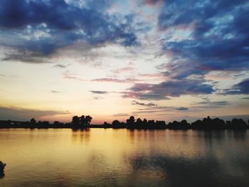 Scenic view of lake against sky during sunset