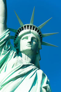 Statue of liberty against clear blue sky